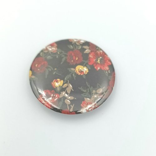 Badge fleurs rouge sur fond noir   37 mm
