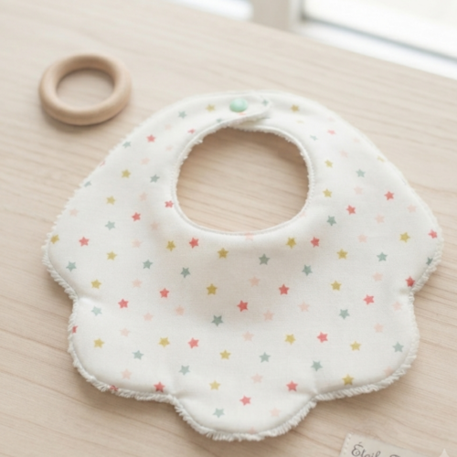 S​uperbe bavoir fleur en coton étoilé