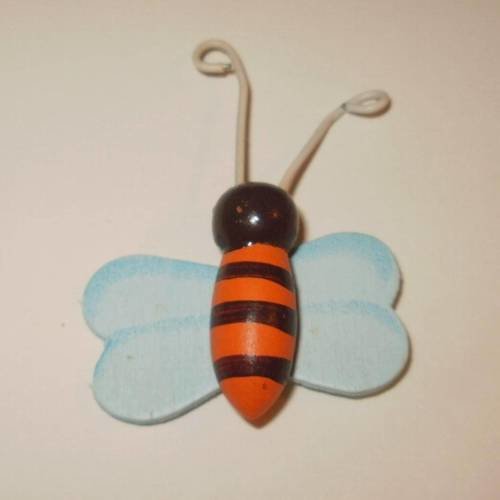 Motif en bois en forme d'abeille orange 