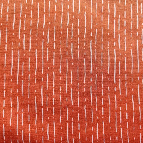 Coupon tissu stenzo popeline de coton - graphique blanc sur fond rouille - 50x50cm