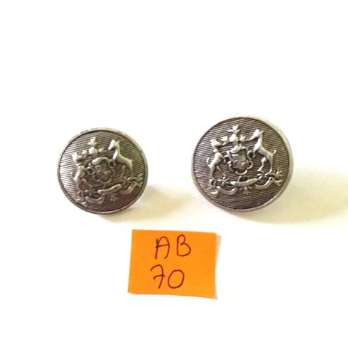 2 boutons en métal argenté - 26mm et 23mm - ab70