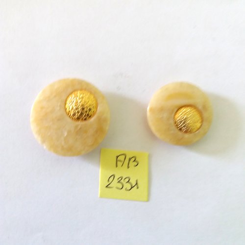 2 boutons en résine beige et doré - 27mm et 22mm - ab2331
