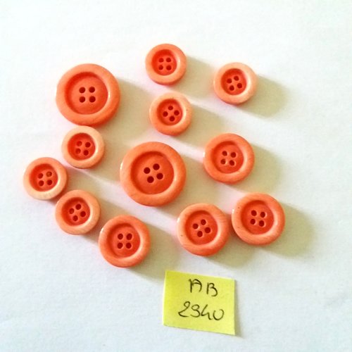 12 boutons en résine rose  - taille diverse - ab2340