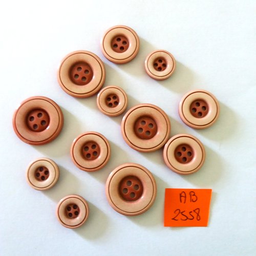 12 boutons en résine rose - taille diverse - ab2558
