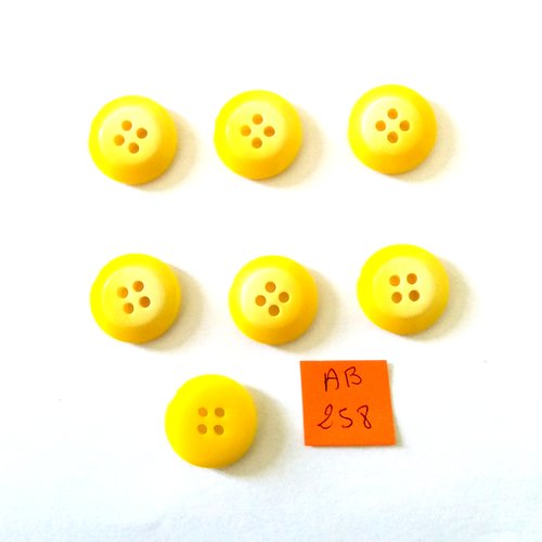 7 boutons en résine jaune - 18mm - ab258