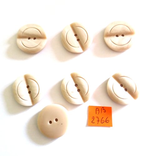 7 boutons en résine crème - 27mm - ab2766