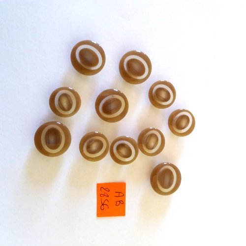 11 boutons en résine beige foncé et transparent - 17mm et 15mm - ab2856