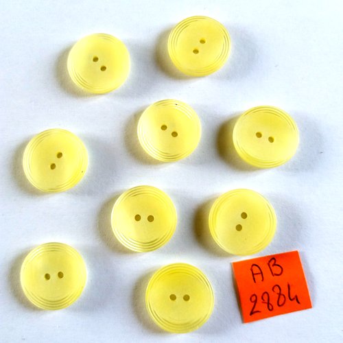 9 boutons en résine jaune pale - 18mm - ab2884