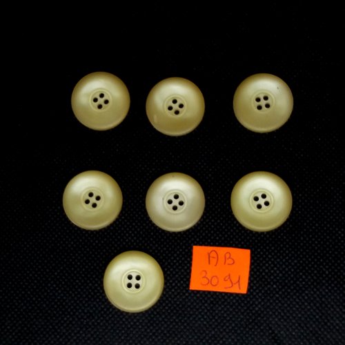 7 boutons en résine jaune pale - 22mm - ab3091