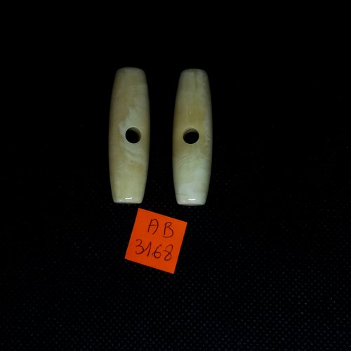 2 boutons brandebourg en résine ivoire - 44x14mm - ab3168