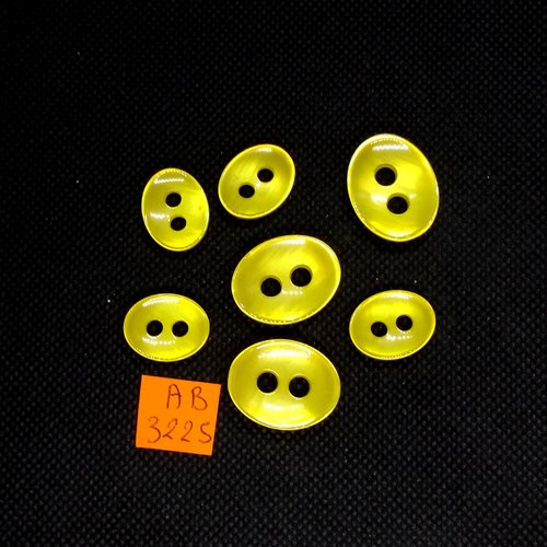 7 boutons en résine jaune - taille diverse - ab3225