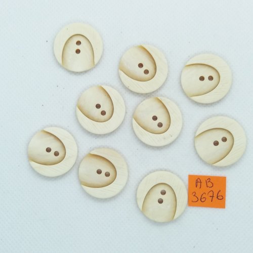 9 boutons en résine ivoire - 23mm - ab3676
