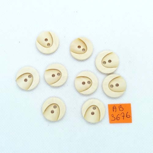 9 boutons en résine ivoire - 18mm - ab3676