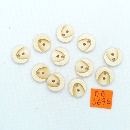 11 boutons en résine ivoire - 14mm - ab3676