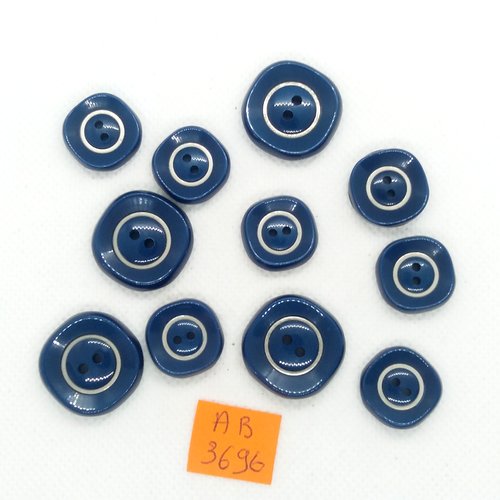 11 boutons en résine bleu et doré  - 22mm et 17mm - ab3696