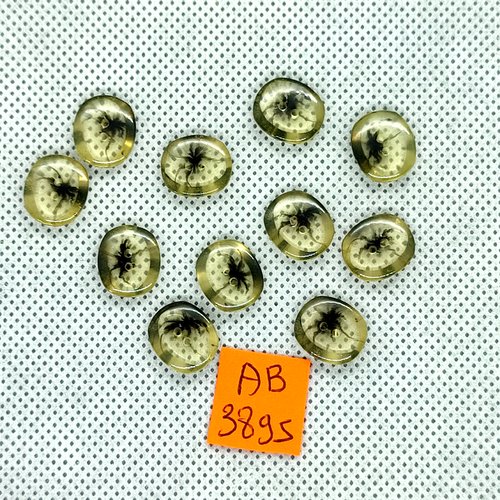 11 boutons en résine noir et transparent - 11x13mm - ab3895