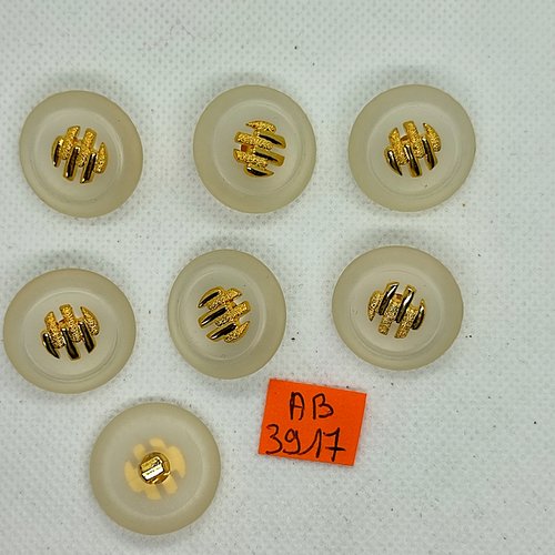 7 boutons en résine transparent et doré  - 23mm - ab3917