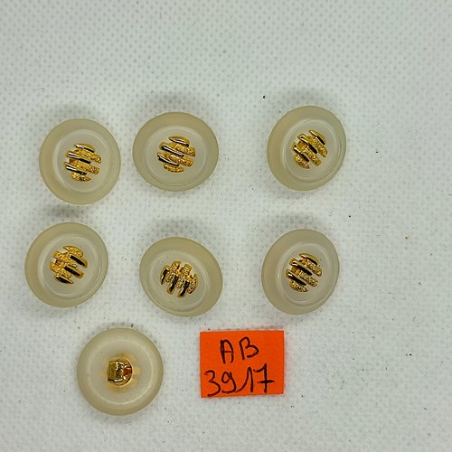 7 boutons en résine transparent et doré  - 18mm - ab3917