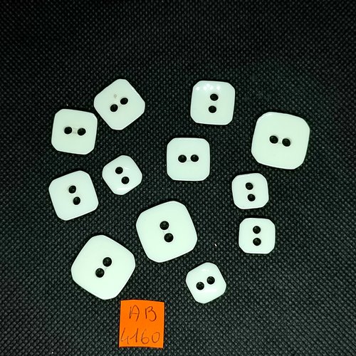 12 boutons en résine blanc - taille diverse - ab4160