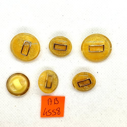 6 boutons en résine jaune pailleté et doré - 22mm et 17mm - ab4558 bis