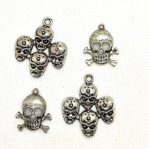 4 breloques/pendentifs en métal argenté - tete de mort - 37x22mm et 28x22mm - 2