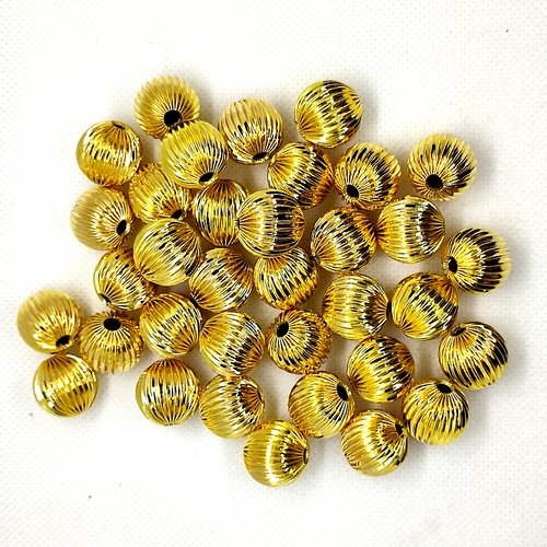 35 perles en métal doré - 16mm