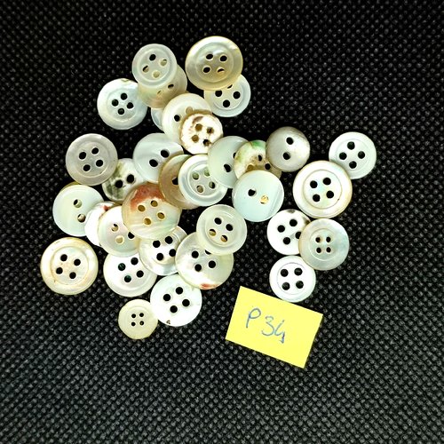 34 boutons en nacre blanc cassé - entre 13mm et 8mm - p34