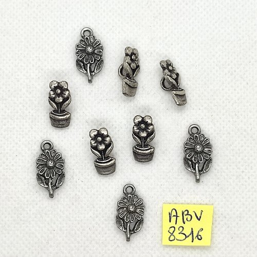 9 breloques en métal argenté - des fleurs - tailles et modèles différents - abv8316