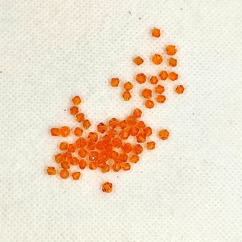 68 perles toupie en verre orange - 3mm - 213
