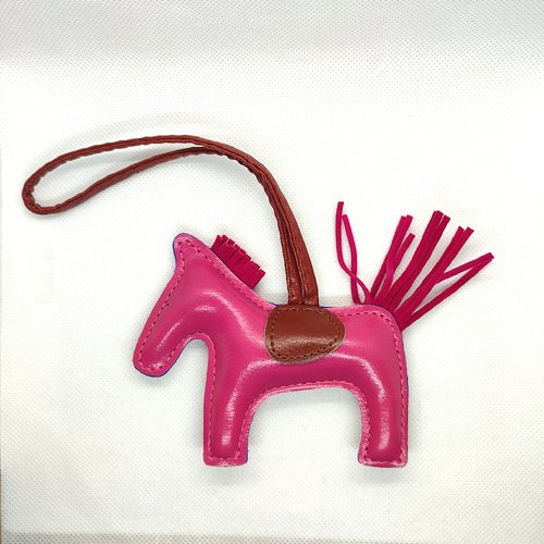 1 cheval en simili cuir rose et fuchsia - 11cm - 95