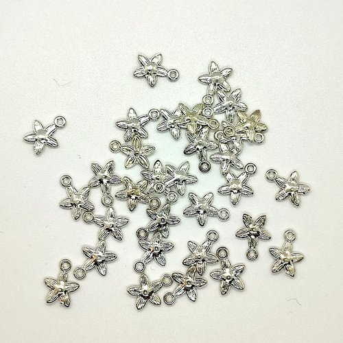 31 breloques en métal argenté - des étoiles - 10x14mm - 154