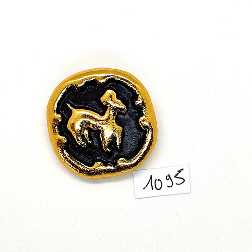 1 bouton en métal doré et noir - un animal - 32mm - bri1095