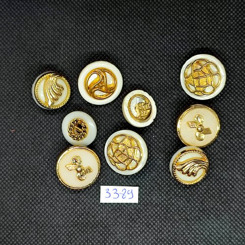 9 boutons en résine blanc et doré - entre 21et 18mm - tr3389