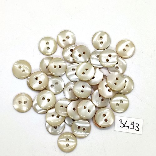 40 boutons en résine blanc cassé - 11/12mm - tr3493