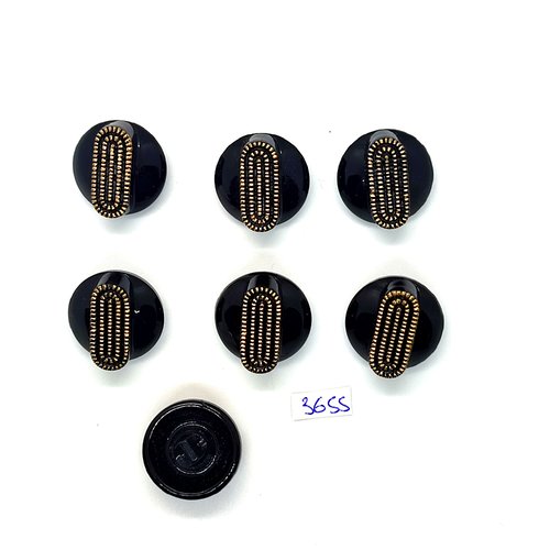 7 boutons en résine noir et doré - 22mm - tr3655