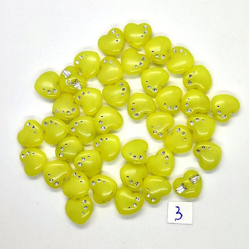 40 boutons en résine des coeurs jaune et argenté - 13mm