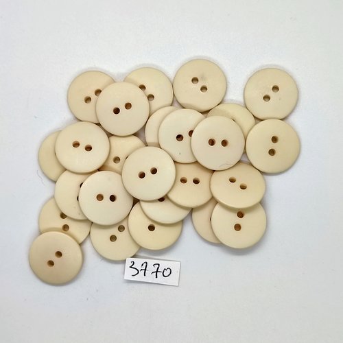 25 boutons en résine ivoire / beige - 18mm - tr3770