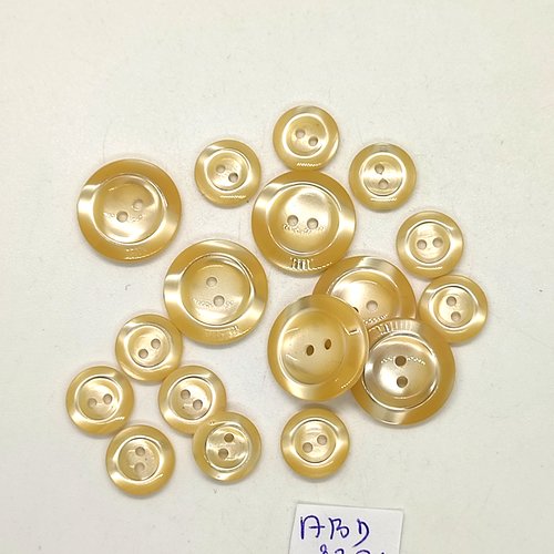 17 boutons en résine jaune clair - 17mm et 11mm - abd2374