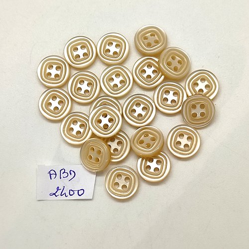 22 boutons en résine beige clair - 11mm - abd2400