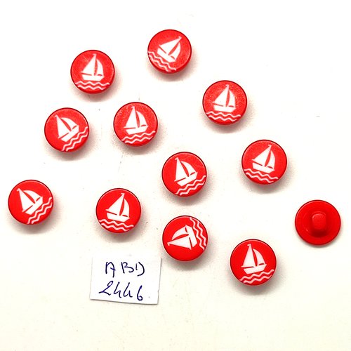 12 boutons fantaisie en résine un bateaux rouge et blanc - 15mm - abd2446