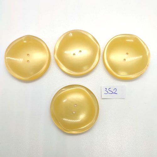 4 boutons en résine jaune clair - 36mm - 352