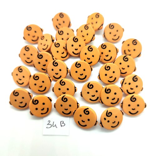 30 boutons fantaisie en résine orange et noir - tete de petit bonhomme -  15mm - 34b