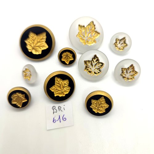 10 boutons en résine noir et transparent et feuille doré - taille diverse - bri616