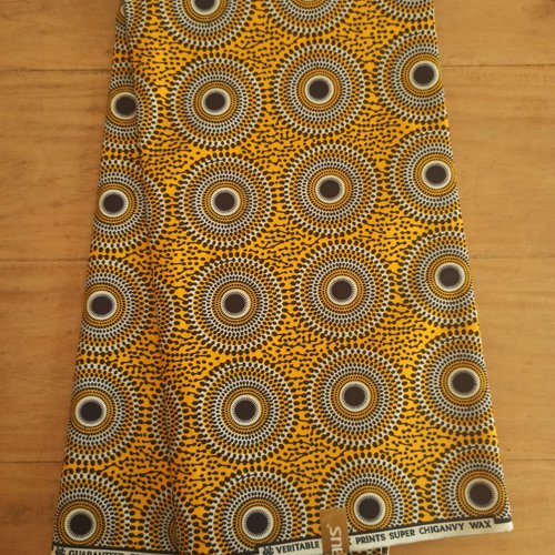Tissu wax - par 50 centimètres - petits disques jaunes et noirs - 100% coton - tissu africain - pagne