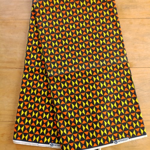 Tissu wax (par unités de 50 cm) - petits triangles jaunes, oranges et noirs - 100% coton - tissu africain - pagne