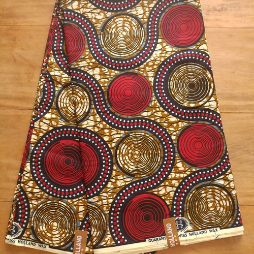 Tissu wax (par unités de 50 cm) - disques rouges et kakis - 100% coton - tissu africain - pagne