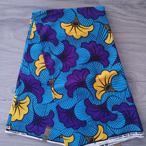 Tissu wax (par unités de 50 cm) - fleur de mariage violettes et jaunes sur fond bleu - 100% coton - tissu africain