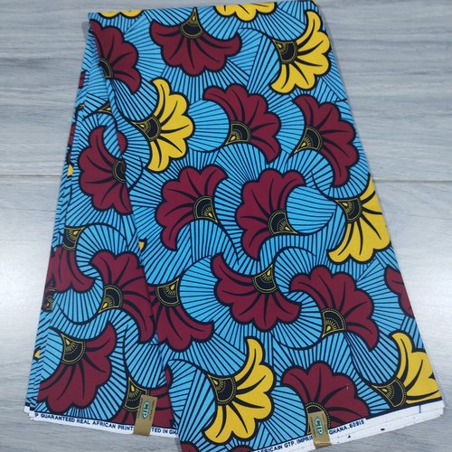 Tissu wax (par unités de 50 cm) - fleurs de mariage rouges et jaunes fond bleu - 100% coton - tissu africain