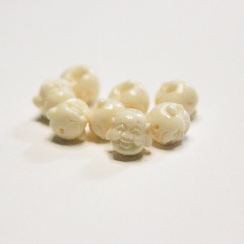 Lot de 8 perles blanches bouddhas
