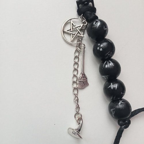 Bijou de sac noir et argenté